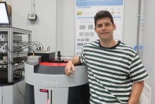 Manuel Suarez close to a PPMS at nanoGUNE 