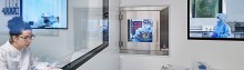 Image of one of 25 Graphenea's employees working in the cleanroom